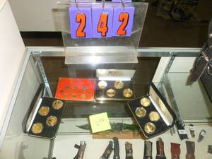 lot 242 image: Grand Casino Coins. As shown. SEE TERMS