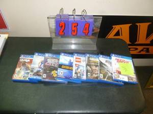 lot 254 image: Play Station 4 games. As shown. SEE TERMS