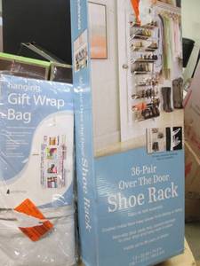 lot 117 image: Hanging Gift Wrap Bag & 36 Pair Ove...