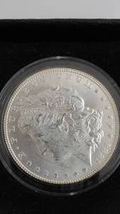 lot 12 image: 1884 Morgan Silver Dollar Uncirculated