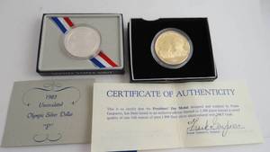 lot 20 image: Olympic Silver Dollar & 1983 Presidents Day Metal