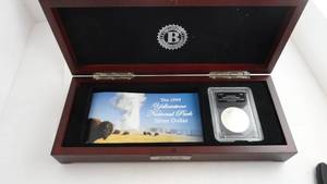lot 23 image: 1999p Yellow Stone Silver Dollar Uncirculated