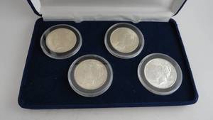 lot 31 image: 4 Peace Silver Dollars