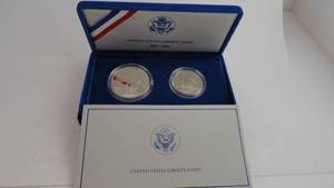 lot 34 image: 2 -1986 Statue of Liberty Coins with certificate