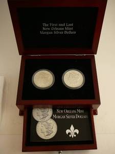 lot 49 image: 1879o, 1964o Morgan Silver Dollars 1st and Last issue New Orleans