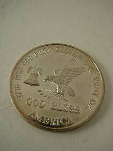 lot 122 image: 1776-1976 God Bless America .999 1 troy ounce