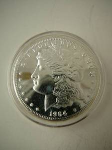 lot 143 image: 1964d Proof Morgan Silver Dollar