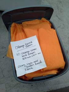 lot 316 image: Lot of (10) Orange Voile Sheer Drapes, Orange Voile and Satin Dcor Fabric