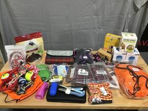 lot 9 image: DOGGY Lot (For SmallMed Dogs) -  Mixed lot of dog toys, leashes, grooming items, harnesses, paw washes, treat toys, flea collars for Small to Medium sized dogs- Over 30 items of dog related products  NewUnused condition