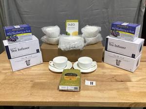 lot 11 image: TEA Lot- Cup & Saucer Set for 6- (2 Sets), 4 Tea Infuser Sets, 4  boxes of tea