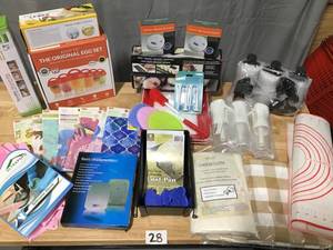 lot 28 image: Kitchen & Home Lot of 30 Items Kitchen Scale, Hand Towels, Reusable Vacuum Bags, Sushi Roller, Gloves and Scrubbers, Loaf Pan, Carbon Monoxide Alarms, Spray Bottles, Table Cloth & Mats, EGGYYO Egg Cooker and More