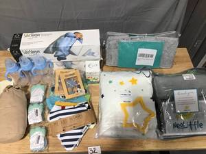 lot 32 image: BABY Lot 20 Items including bottles, bibs, milestone blanket, teething items, sling, diaper caddy and more