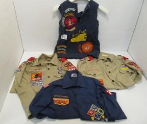 lot 58 image: 4 Vintage Scout Uniform Shirts w TONS of Patches and Pins