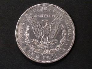 lot 7 image: 1878 S Morgan Silver Dollar...