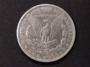 lot 15 image: 1882 S Morgan Silver Dollar...