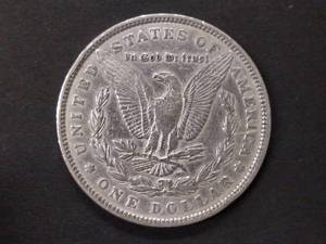 lot 18 image: 1885 Morgan Silver Dollar...