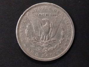 lot 17 image: 1884 S Morgan Silver Dollar...