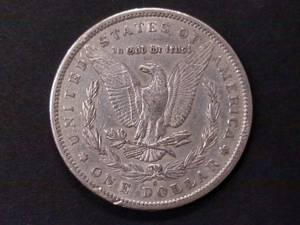 lot 27 image: 1897 S Morgan Silver Dollar...