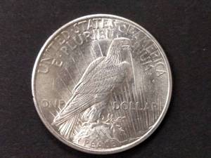 lot 82 image: 1925 Peace Silver Dollar...