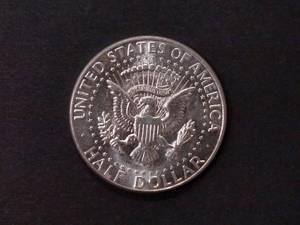 lot 105 image: 1964 AU Kennedy Silver Half Dollar...