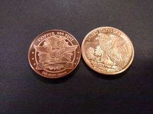 lot 132 image: (2) One Ounce .999 Copper Coins...