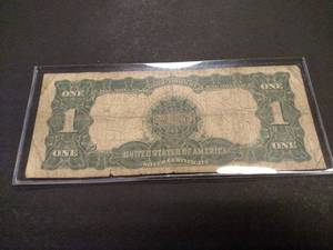lot 134 image: 1899 Large Size One Dollar Black Ea...