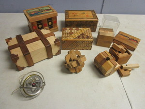 lot 135 image: COLLECTION OF WOODEN PUZZLE BOXES