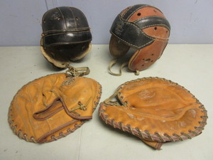 lot 168 image: VINTAGE LEATHER FOOTBALL HELMETS, DRAPER MAYNARD SOFTBALL MITTS