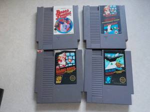 lot 9 image: Bases Loaded, Duck Hunt, Mario Brot...