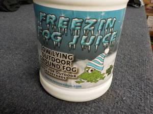 lot 213 image: 128 oz Jug Freezin Fog Juice...