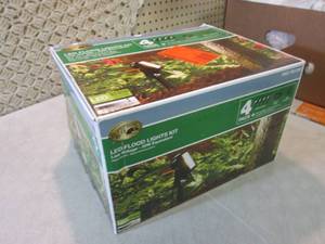 lot 34 image: 4-Pack Low Voltage Black Outdoor In...