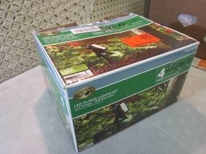 lot 35 image: 4-Pack Low Voltage Black Outdoor In...