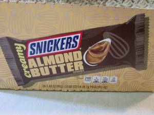 lot 254 image: Box of 24 Snickers Creamy Almond Bu...