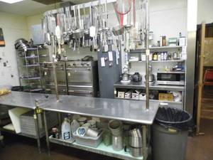 lot 9 image: Stainless Steel Table  wRack & Can Opener
