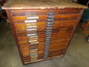 lot 1 image: Vintage Hamilton printers cabinet 25 drawer all original some drawers have letters lead