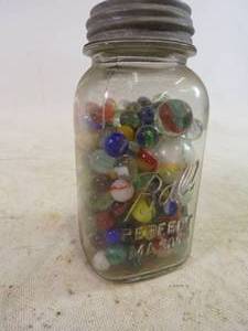 lot 82 image: Jar full of Vintage Marbles with large Shooters