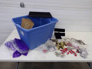 lot 104 image: Very Large Lot of Costume Jewelry, Unused great for resale plus display racks and bags