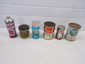 lot 111 image: Vintage Outboard oil cans and more