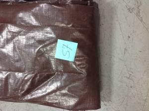 lot 57 image: Everbilt 16 ft. x 20 ft. Brown Heavy-Duty Tarp not used