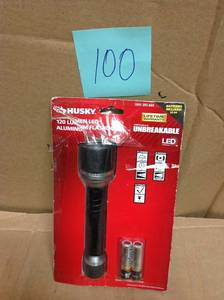 lot 100 image: Husky 120 Lumens Virtually Unbreakable Flashlight in good condition