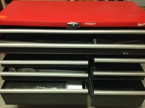 lot 215 image: Milwaukee High Capacity 56 in. 10-Drawer Roller Cabinet Tool Chest Scratchs and dents please review the pictures