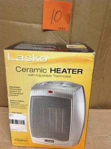 lot 10 image: Lasko 9.2 in. 1500-Watt Electric Portable Ceramic Compact Heater in good condition