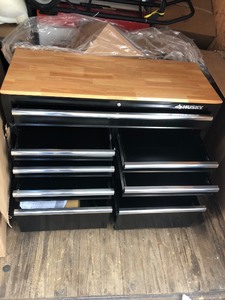 lot 206 image: Husky 46 in. W x 18.1 in. D 9-Drawer Tool Chest Mobile Workbench with Solid Wood Top not used whit damage please review the pictures