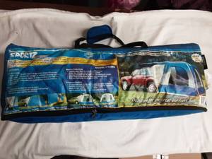 lot 29 image: Sportz Model 82000 Tent For Back Of SUV