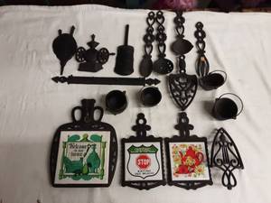 lot 49 image: Lot Of Cast Iron Trivets & Wall Decor