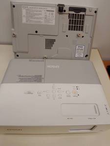 lot 982 image: Epson LCD Projector Power Lite 83C (2). With remotes, Model EMP83 previously installed.