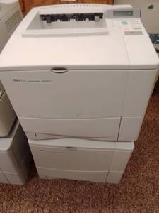 lot 993 image: HP Laser Jet Printers (2) Model 450N Powers up, no known issues.