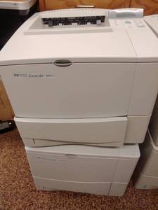 lot 994 image: HP Laser Jet Printers (2) 4000N Powers up, no known issues.