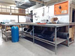 lot 898 image: Welded Heavy-Duty Workbench and misc. tools  see Pictures for details. 12 ft. X 3 ft 6 ft. x 4 ft. easy removal through overhead door. Great Value