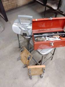lot 1133 image: Shop Stools (2) caster movers (2) toolbox with contents and more.